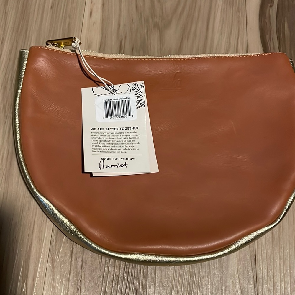 NWT large crescent pouch in terra cotta and gold leather